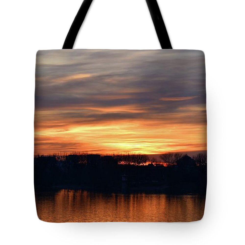 Nature Tote Bag featuring the photograph Romantic Sunset Over Water Caught in Fire by Leonida Arte