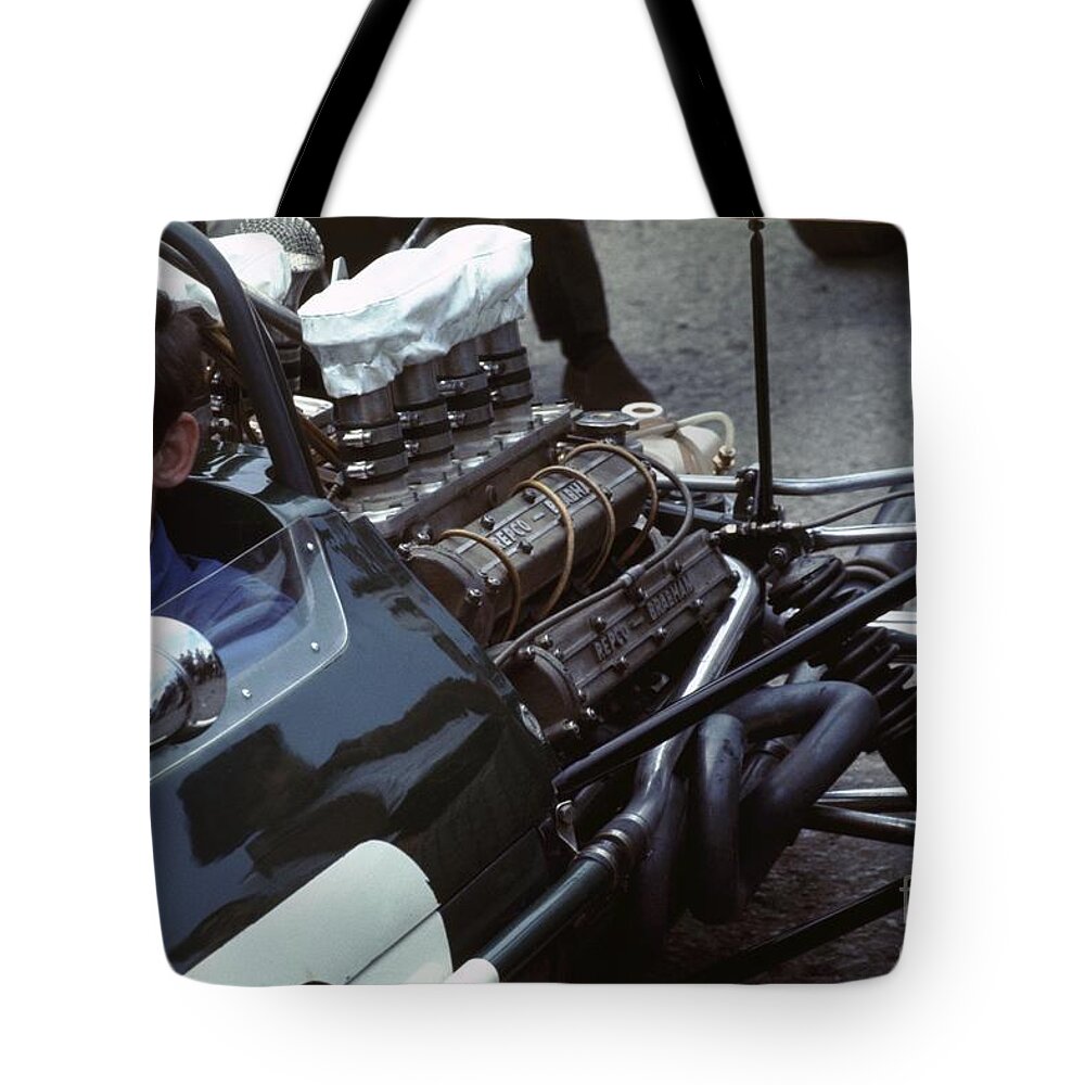 Ron Dennis Tote Bag featuring the photograph Ron Dennis by Oleg Konin