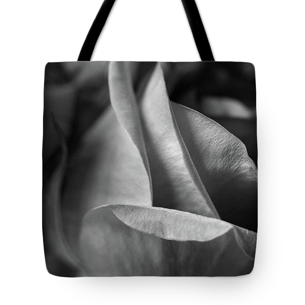 Rose Petals Bw Tote Bag featuring the photograph Rose Petals BW by Natalie Dowty