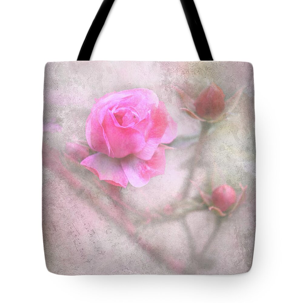 Abstract Tote Bag featuring the photograph Roses in abstract by Sue Leonard