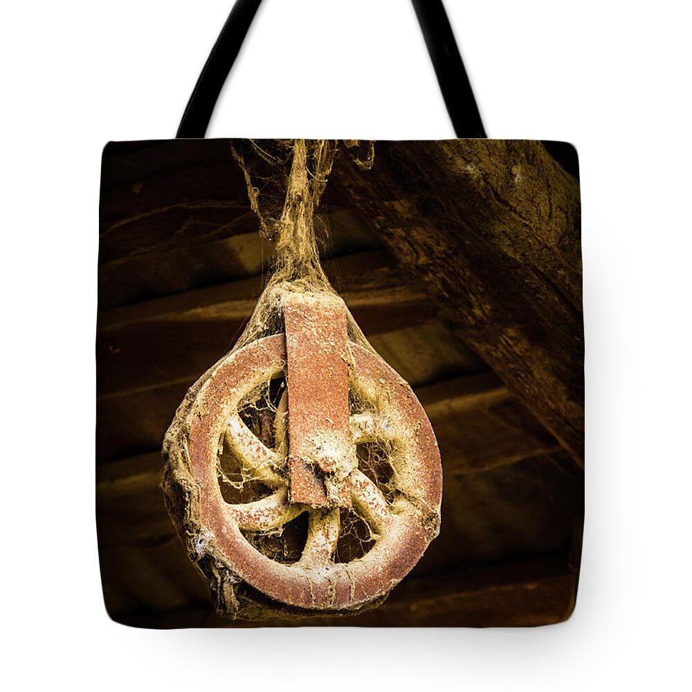 Italy Tote Bag featuring the photograph Rusty Pulley by Craig A Walker