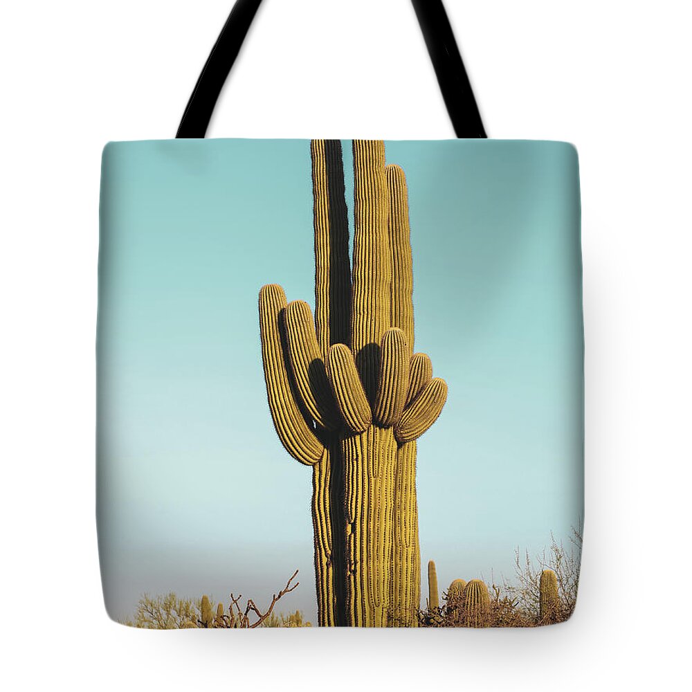 Saguaro Tote Bag featuring the photograph Safer in Numbers by Katie Dobies