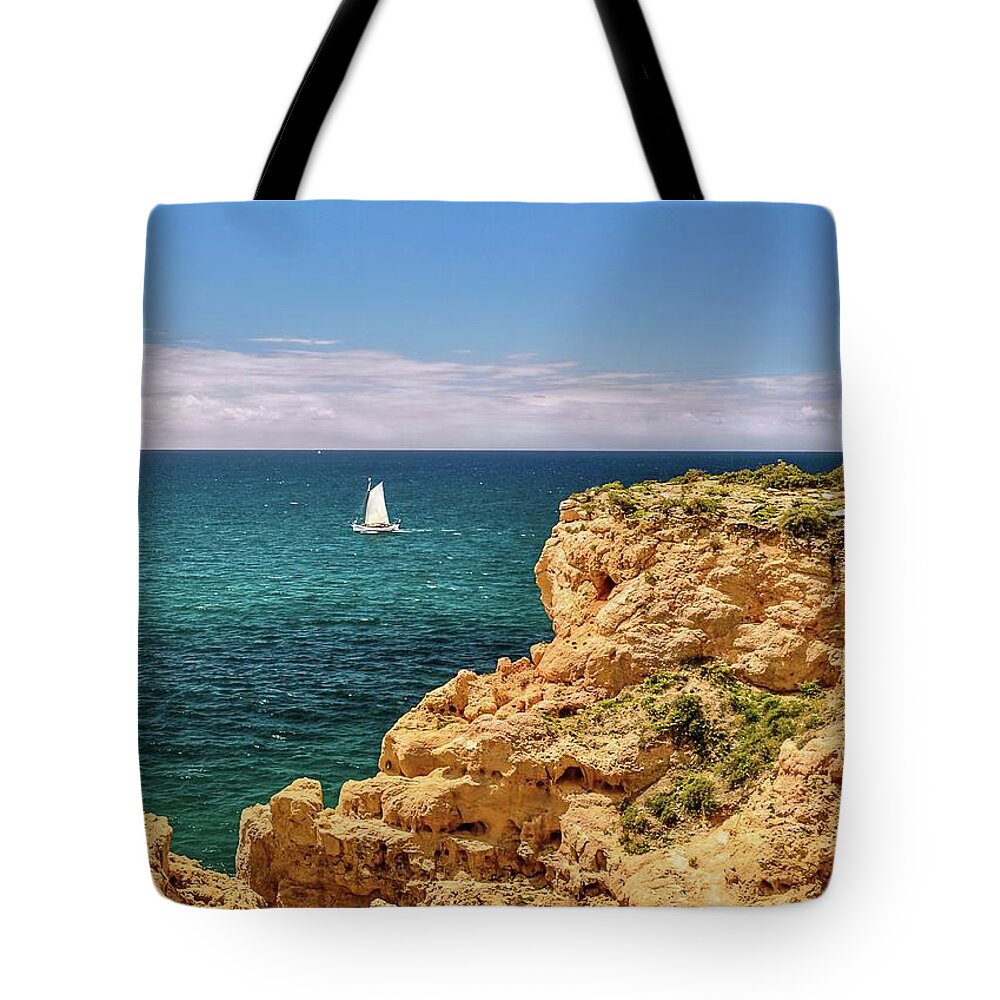 Algarve Coast Tote Bag featuring the photograph Sailing Off the Algarve Coast in Portugal by Rebecca Herranen