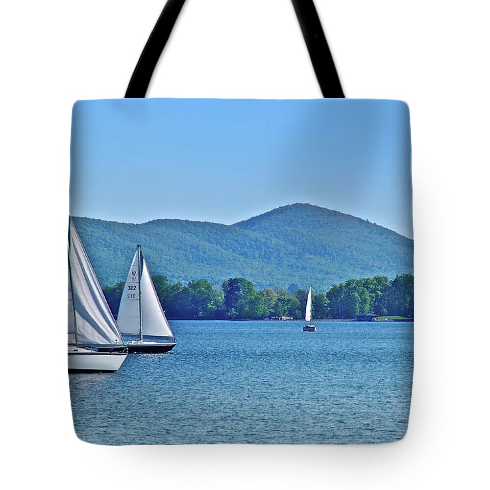 Smith Mountain Lake Sailboats Tote Bag featuring the photograph Sailors In Motion by The James Roney Collection