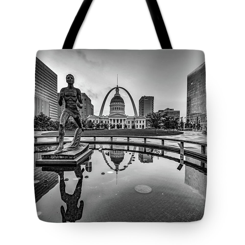 Saint Louis Tote Bag featuring the photograph Saint Louis Skyline and Gateway Arch Reflections Over Kiener Plaza Fountain - Black and White by Gregory Ballos