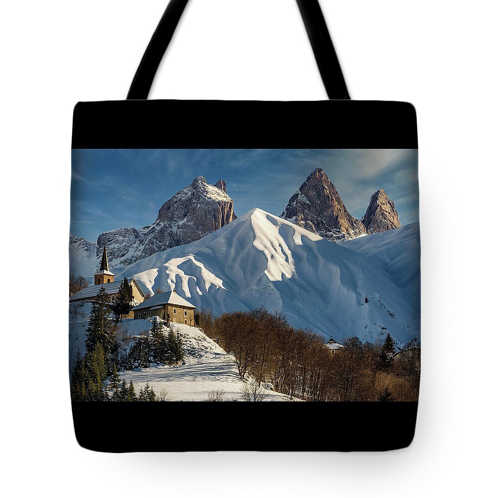 Montrond Tote Bag featuring the photograph Saint Nicolas church and the Aiguilles d Arves by Olivier Parent