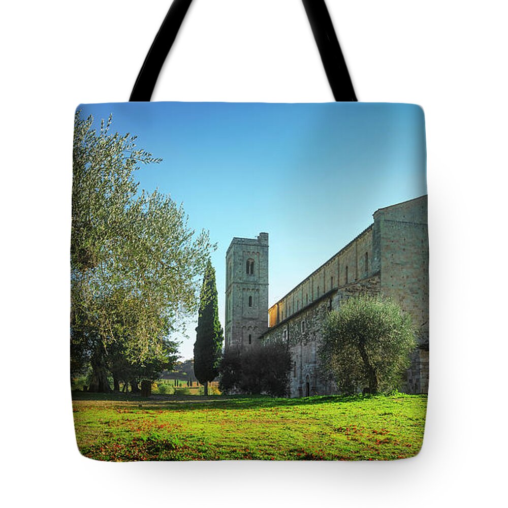 Montalcino Tote Bag featuring the photograph Sant Antimo abbey and olive tree. Montalcino. Tuscany by Stefano Orazzini