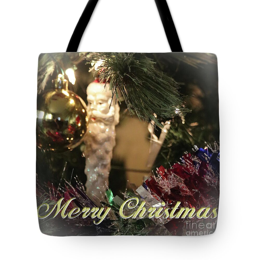 Merry Tote Bag featuring the photograph Handblown glass ornament by Darrell Foster