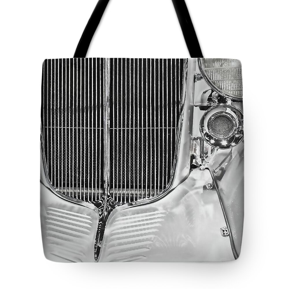 American Tote Bag featuring the photograph Sculpted Metal by Loren Gilbert