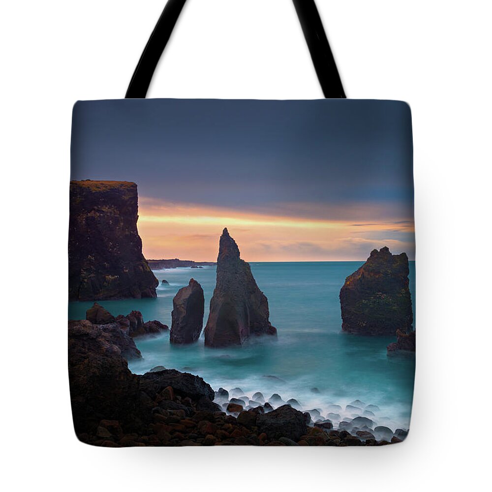 Iceland Tote Bag featuring the photograph Sea Stack by Henry w Liu