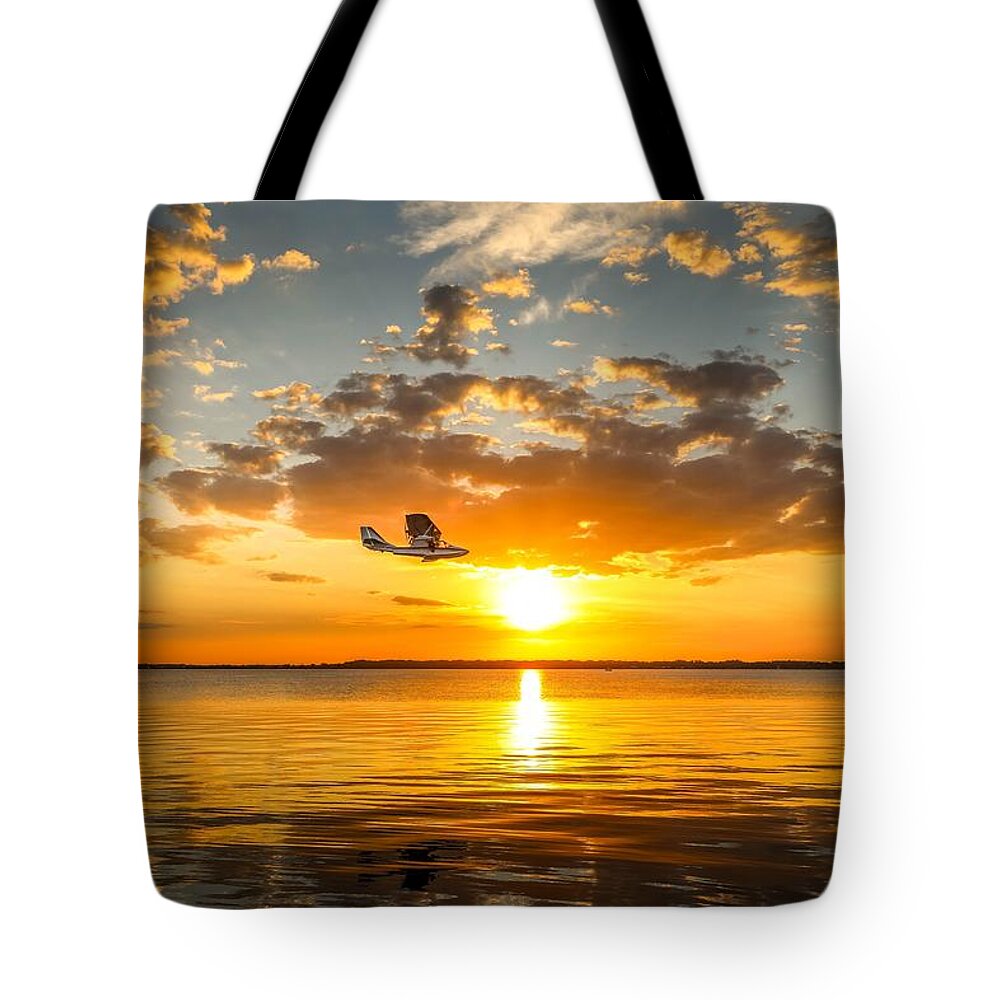 Seaplane Tote Bag featuring the photograph Seaplane over Sunset by Susan Rydberg