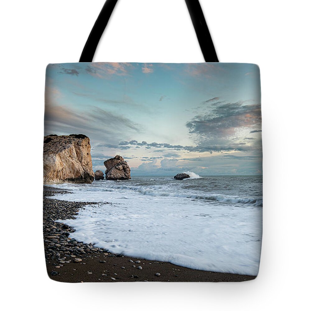 Sea Waves Tote Bag featuring the photograph Seascape with windy waves and moody sky during sunset by Michalakis Ppalis
