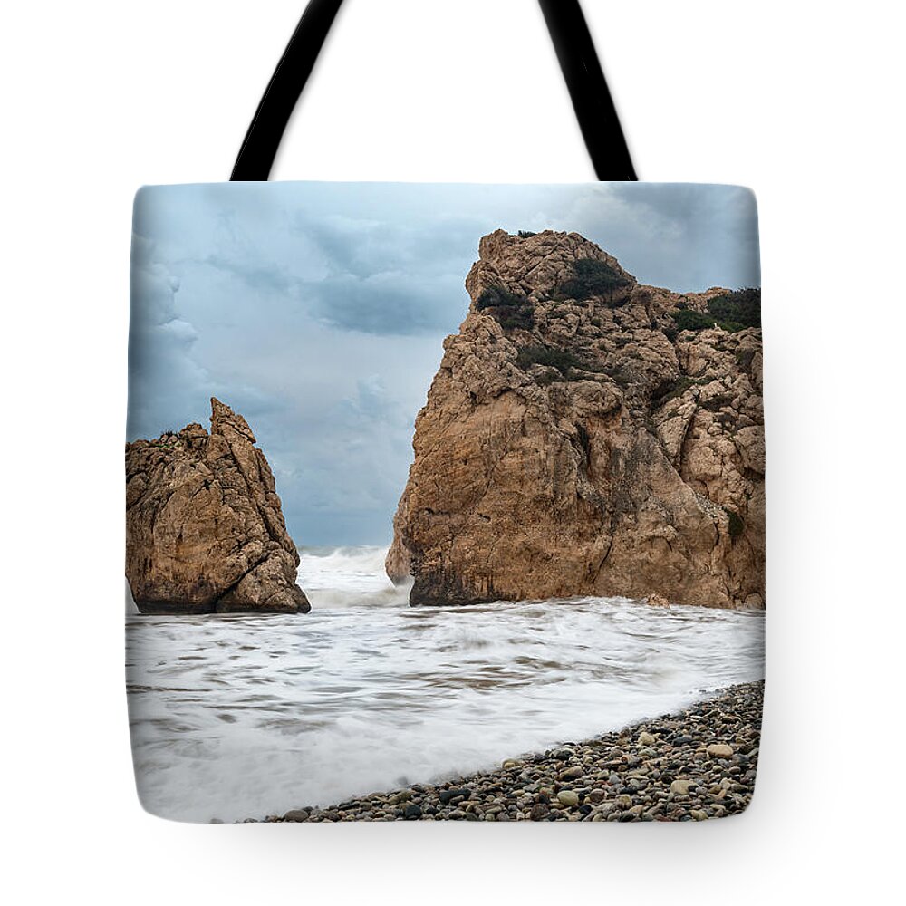 Coastline Tote Bag featuring the photograph Seascapes with windy waves. Rock of Aphrodite Paphos Cyprus by Michalakis Ppalis