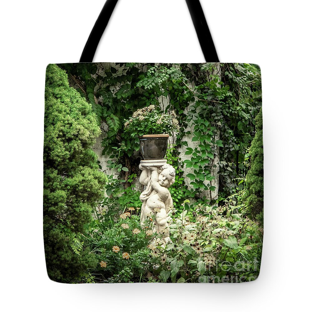 Romance Tote Bag featuring the photograph Secret Garden With Cupid by Susan Vineyard