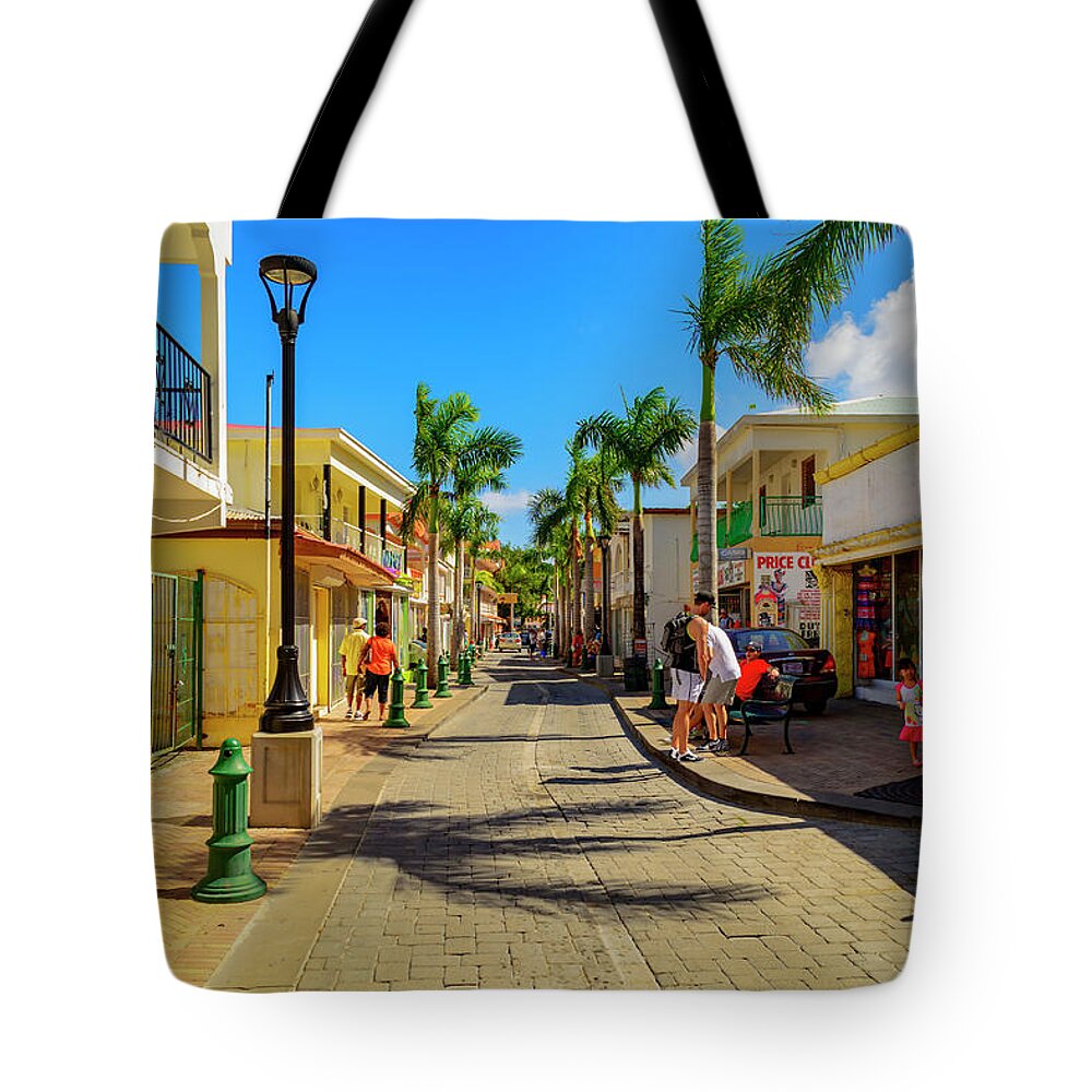 Trees; Travel; People; Color; Skies; Clouds Tote Bag featuring the photograph Shopping in Saint Maarten by AE Jones