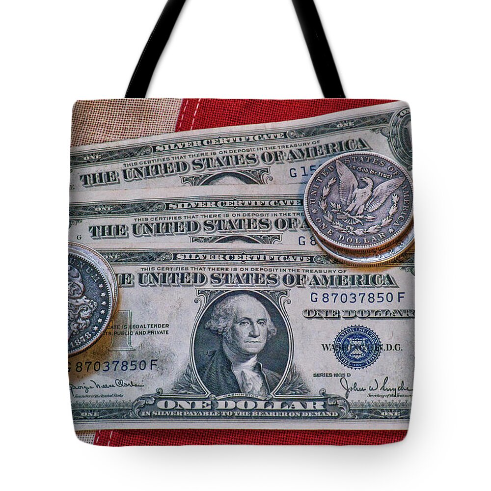 Silver Certificate And Silver Dollars On Flag Tote Bag featuring the photograph Silver Certificate and Silver Dollars on Flag by Randy Steele