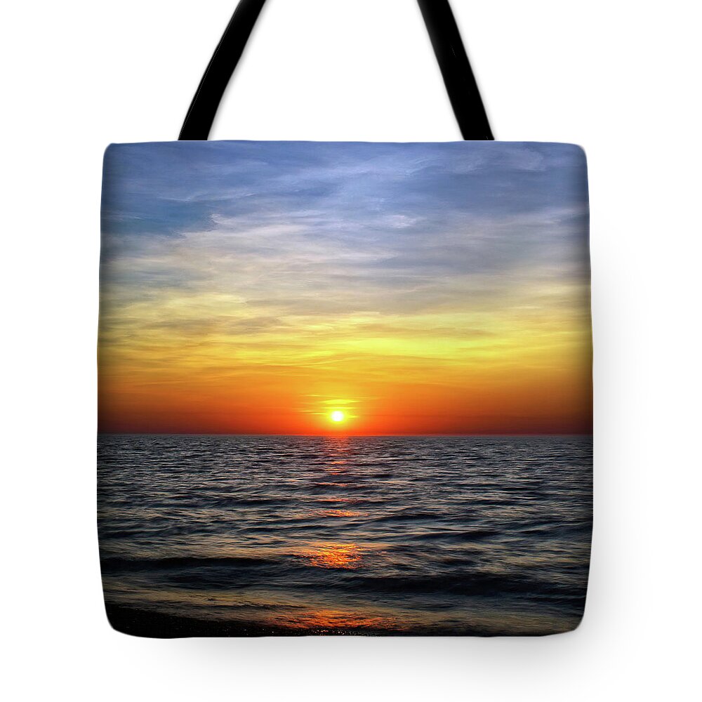 Lake Michigan Tote Bag featuring the photograph Skipping Across The Waves by Kathi Mirto