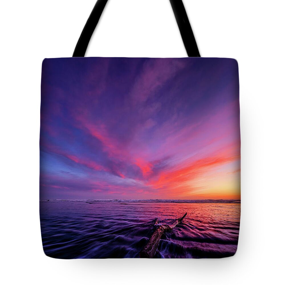 Grayland Tote Bag featuring the photograph Sky Ablaze by Dan Mihai