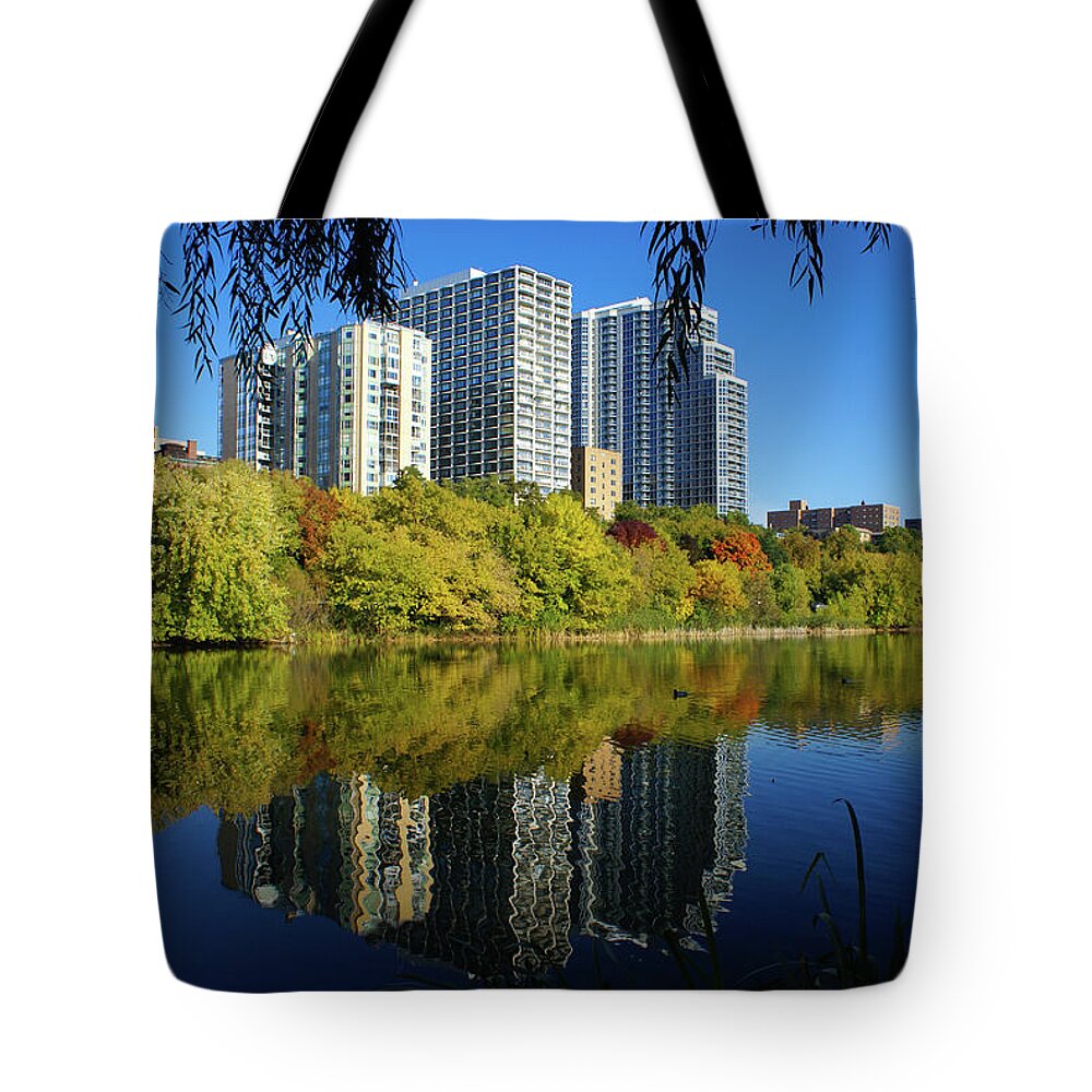 Milwaukee Tote Bag featuring the photograph Autumn Skyline from Under the Trees by Deb Beausoleil