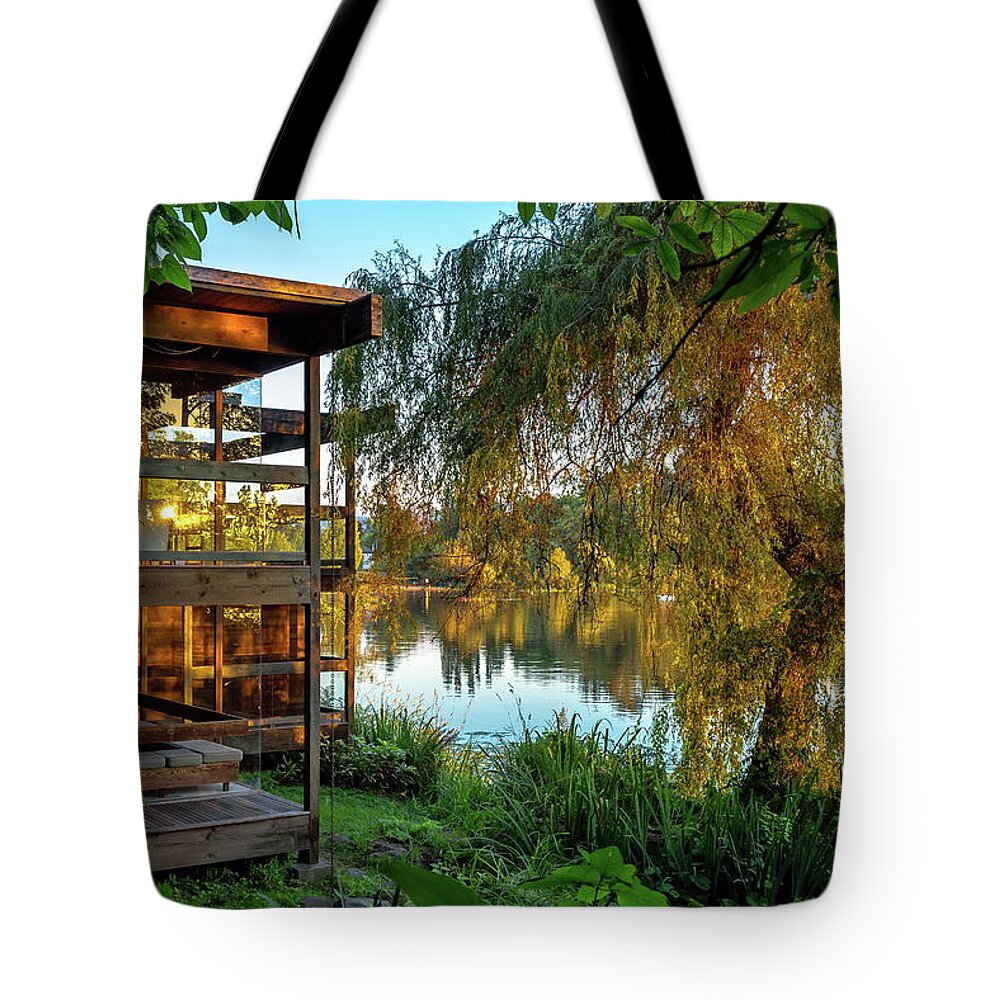 Alex Lyubar Tote Bag featuring the photograph Small Lonely House at the Forest Lake by Alex Lyubar