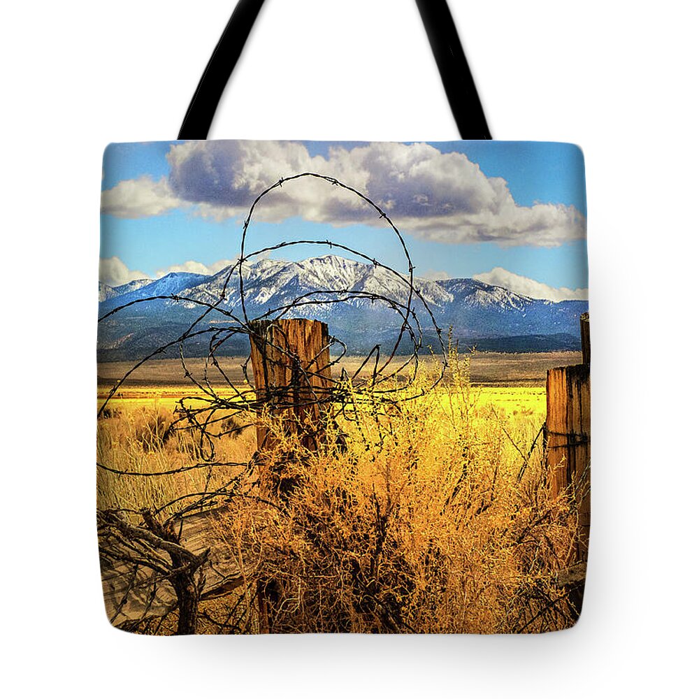 Yellow Desert Cowboy Snow Mountains Tote Bag featuring the photograph Snow Covered Mountains by Jerry Cowart
