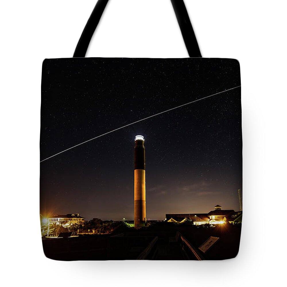 Caswell Beach Tote Bag featuring the photograph Space Station at the Lighthouse by Nick Noble