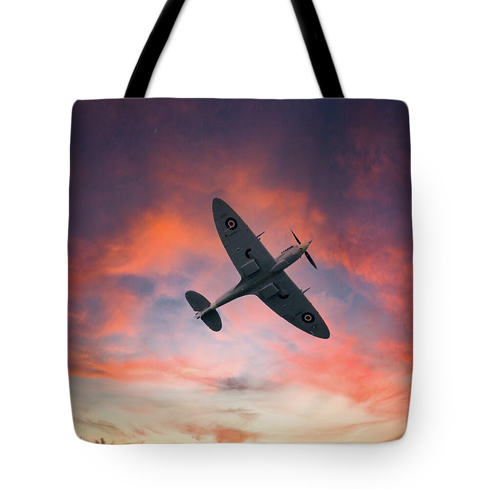 Eastbourne International Airshow Tote Bag featuring the photograph Spitfire flying at sunset by Andrew Lalchan