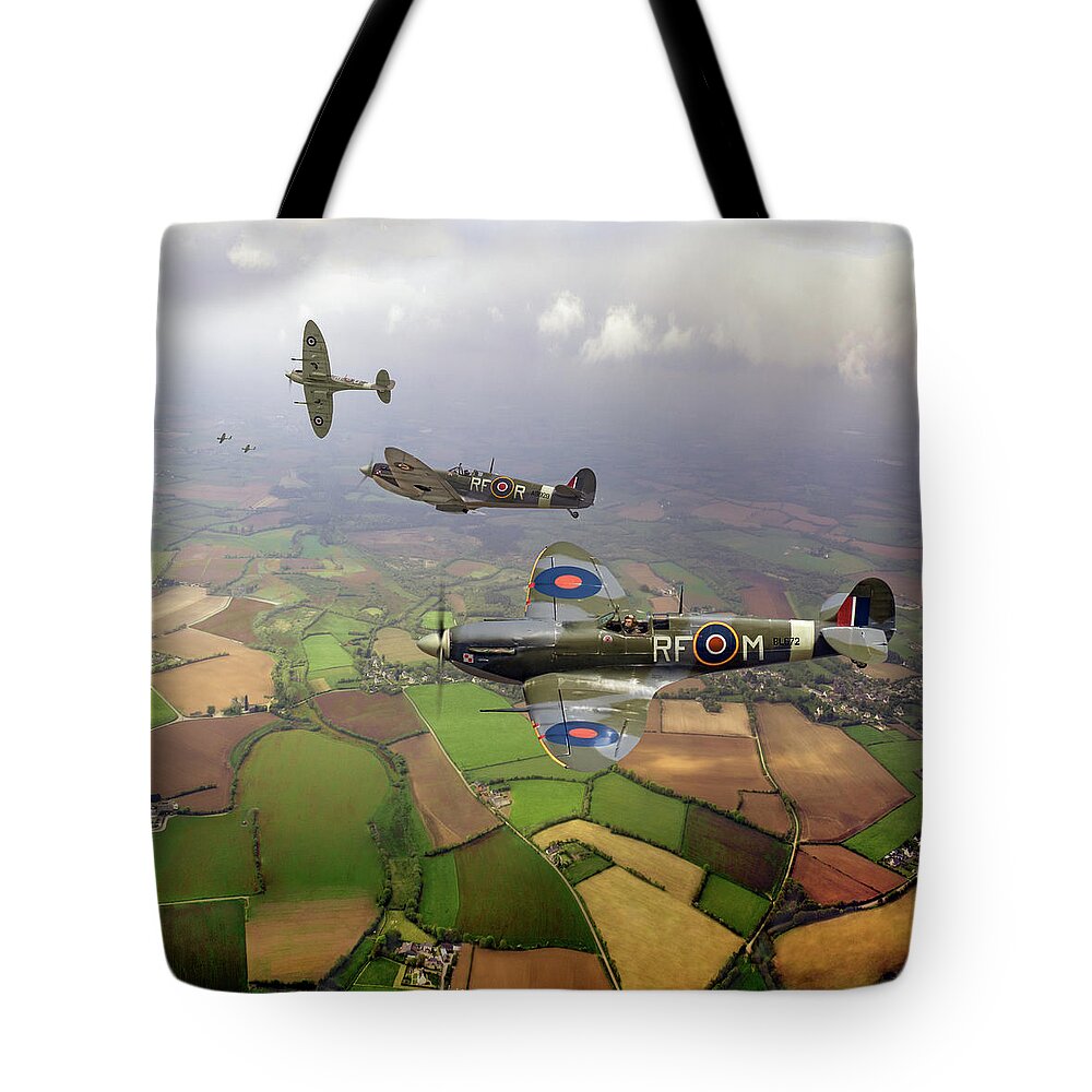 Spitfire Tote Bag featuring the photograph Spitfire sweep colour version by Gary Eason