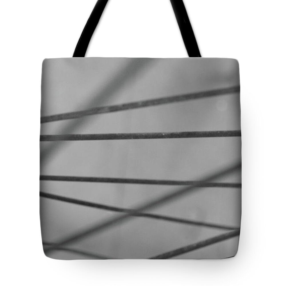 Bicycle Tote Bag featuring the photograph Spoked by Jeffrey Peterson
