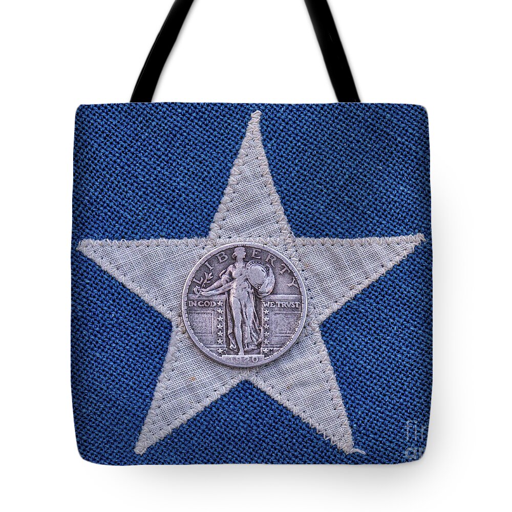Old Silver Quarters Tote Bag featuring the photograph Standing Liberty Quarter on Flag Star by Randy Steele