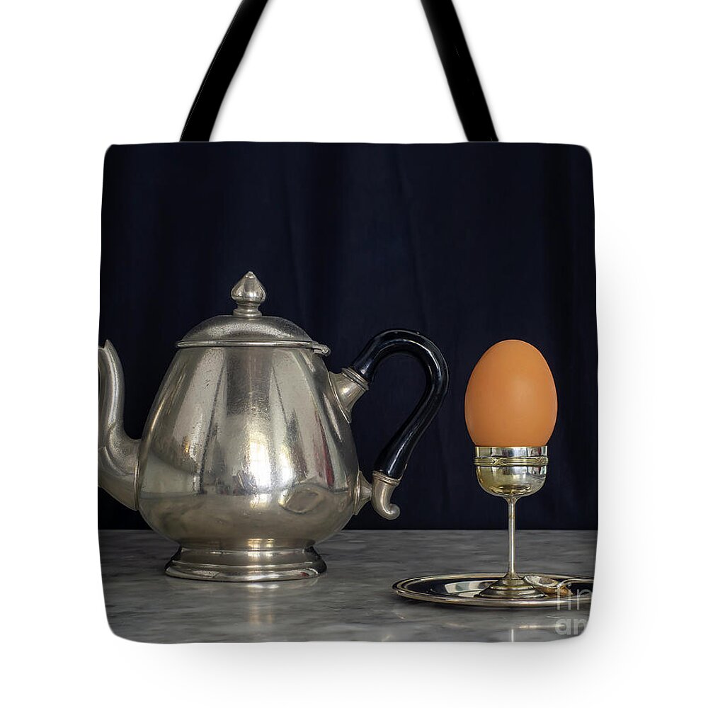 Patina Tote Bag featuring the photograph Sterling Silver Eggcup and Teapot Black Background Still Life by Pablo Avanzini