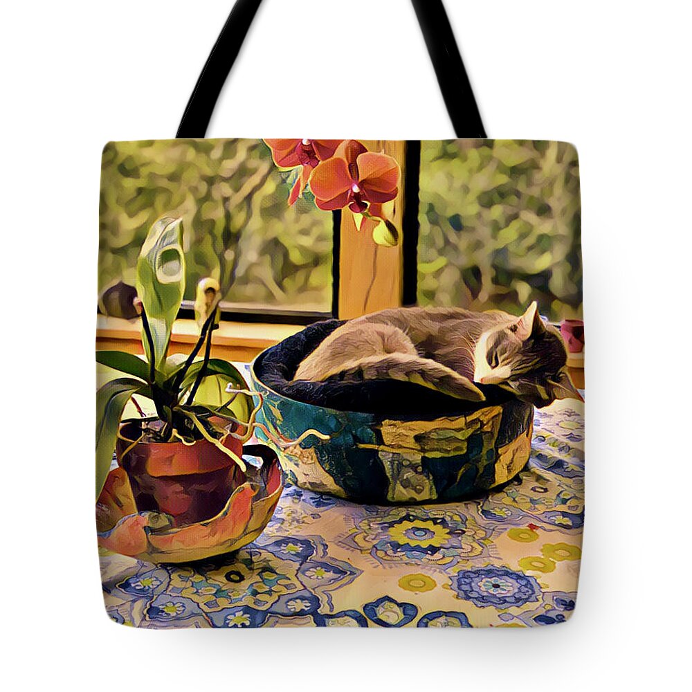 Peaceful Sleeping Cat Tote Bag featuring the photograph Still Life Orange Orchid With Sleeping Kitty In Cat Bed by Debra Amerson