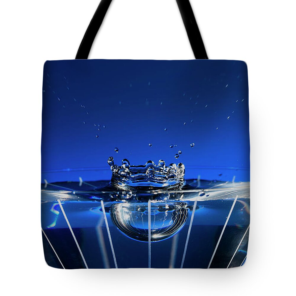 North Wilkesboro Tote Bag featuring the photograph Stop Motion Martini Glass Blue Splash by Charles Floyd