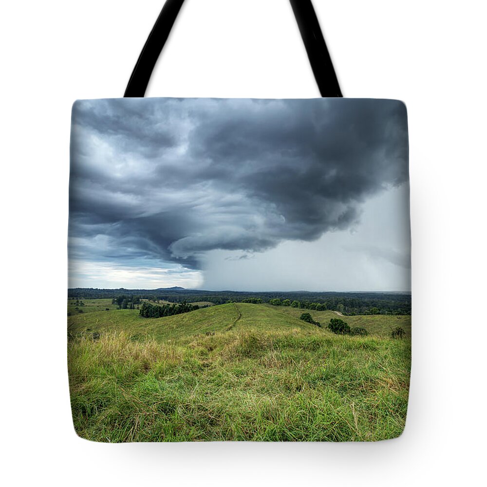 Storm Tote Bag featuring the photograph Storm cell by Nicolas Lombard