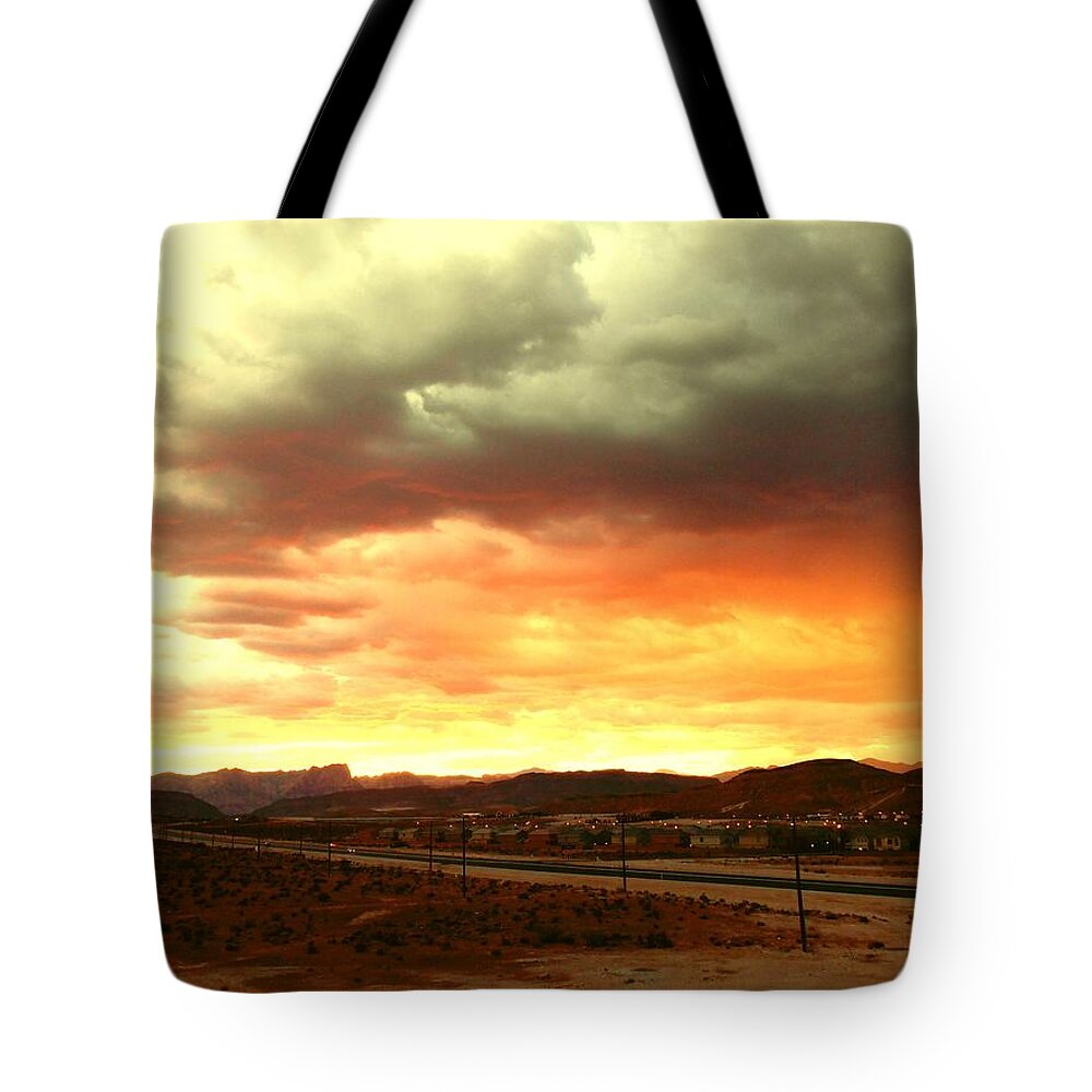 Sunset Tote Bag featuring the photograph Storm Clouds at Sunset by Dietmar Scherf