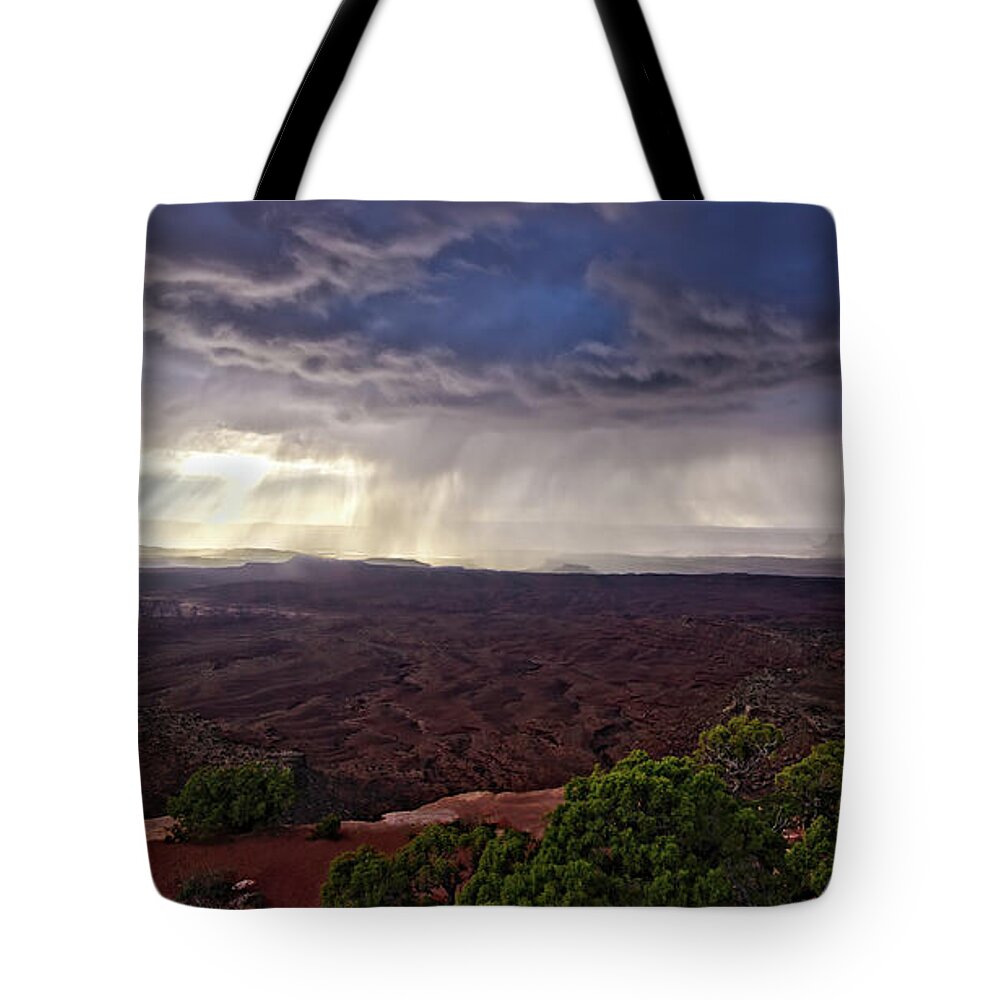 America Tote Bag featuring the photograph Storm over Grand View Point Overlook in canyonlands natio by Jean-Luc Farges