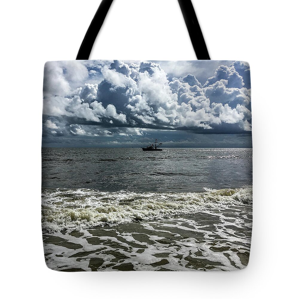 Ocean Tote Bag featuring the photograph Stormy Boat by David Beechum