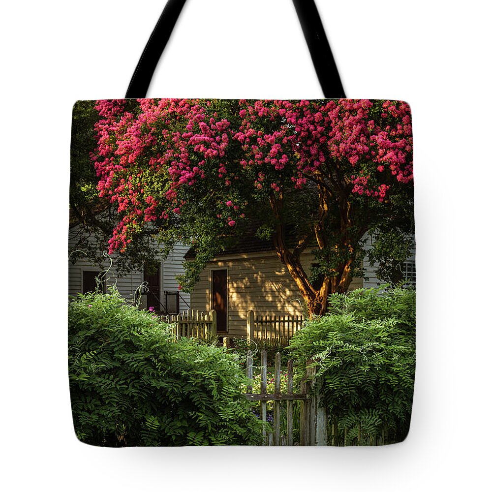 Colonial Williamsburg Tote Bag featuring the photograph Summer Sunset in a Garden by Rachel Morrison