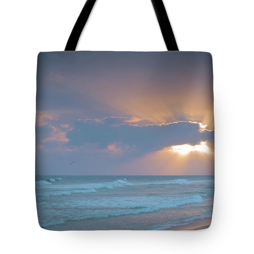 Beach Sunset Tote Bag featuring the photograph Sun and Clouds in Ilha Deserta. Algarve by Angelo DeVal