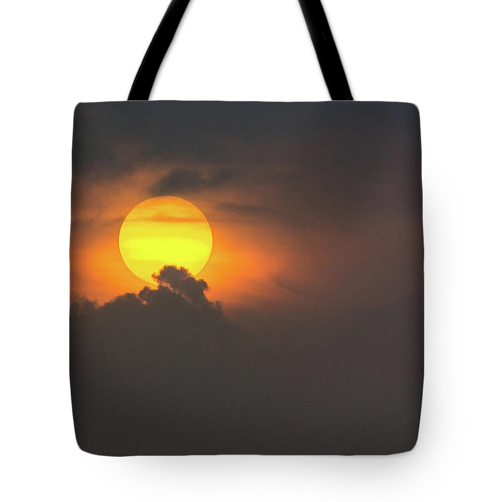 Clouds Tote Bag featuring the photograph Sun popping into clouds by Andrew Lalchan