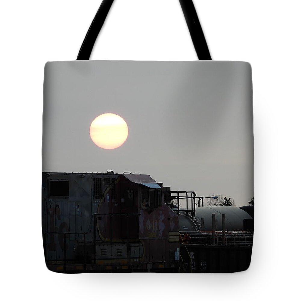 Sun Tote Bag featuring the photograph Sun Rise over the Train by Amanda R Wright
