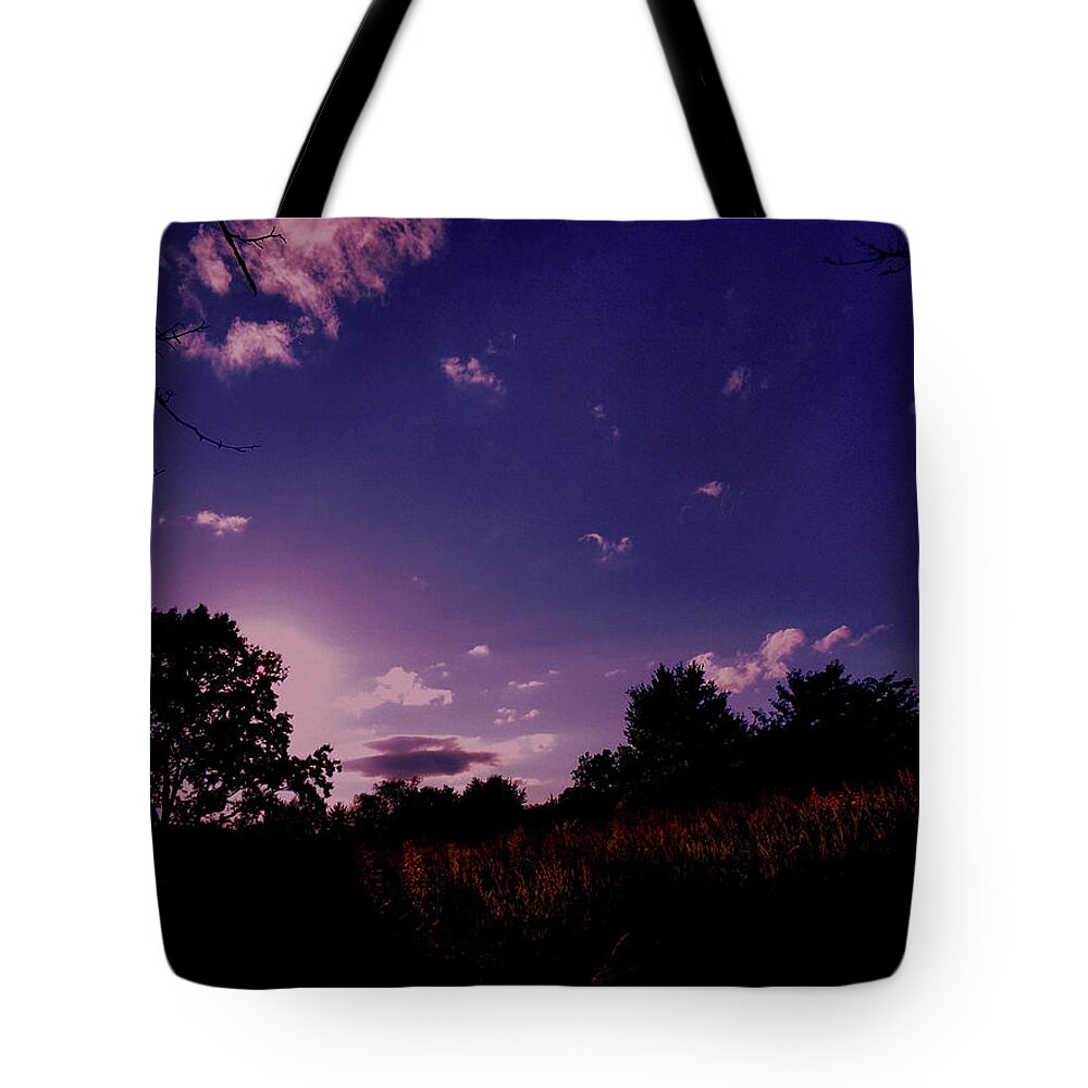Sundown Tote Bag featuring the photograph Sundown in the Field by Christopher Reed