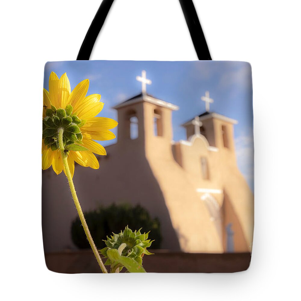 Taos Tote Bag featuring the photograph Sunflower and the St Francis de Asis Church by Elijah Rael