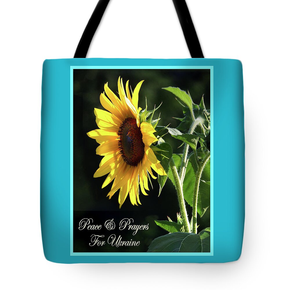Ukraine Tote Bag featuring the photograph Sunflower of Peace and Solidarity by Nancy Griswold