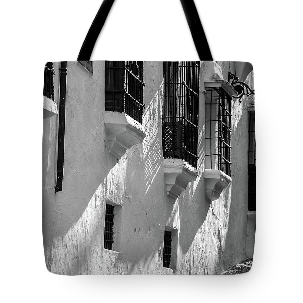 Black And White Tote Bag featuring the photograph Sunrays on Windows by Naomi Maya