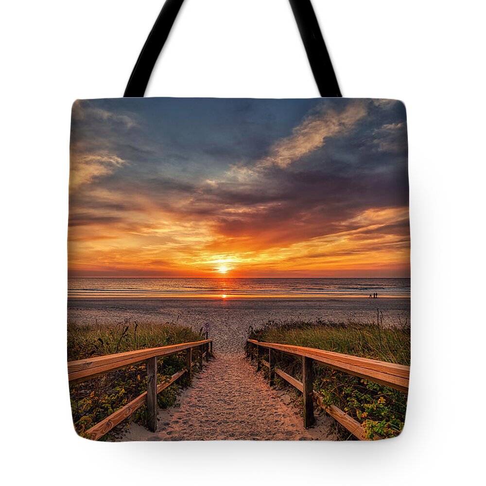 Sunrise Tote Bag featuring the photograph Sunrise at Footbridge Beach by Penny Polakoff