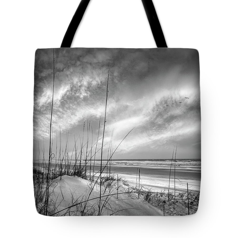 Black Tote Bag featuring the photograph Sunrise Ocean Breezes Black and White by Debra and Dave Vanderlaan