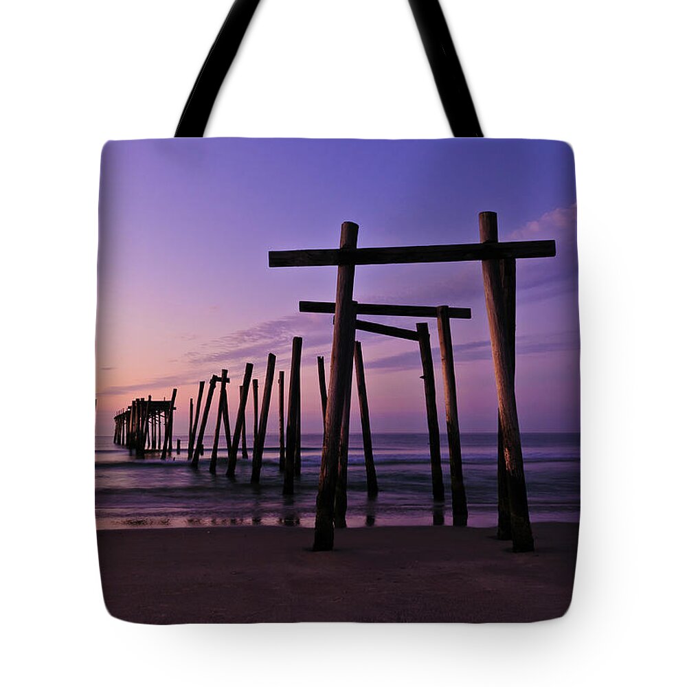 59th Pier Tote Bag featuring the photograph Sunrise on the beach by Louis Dallara