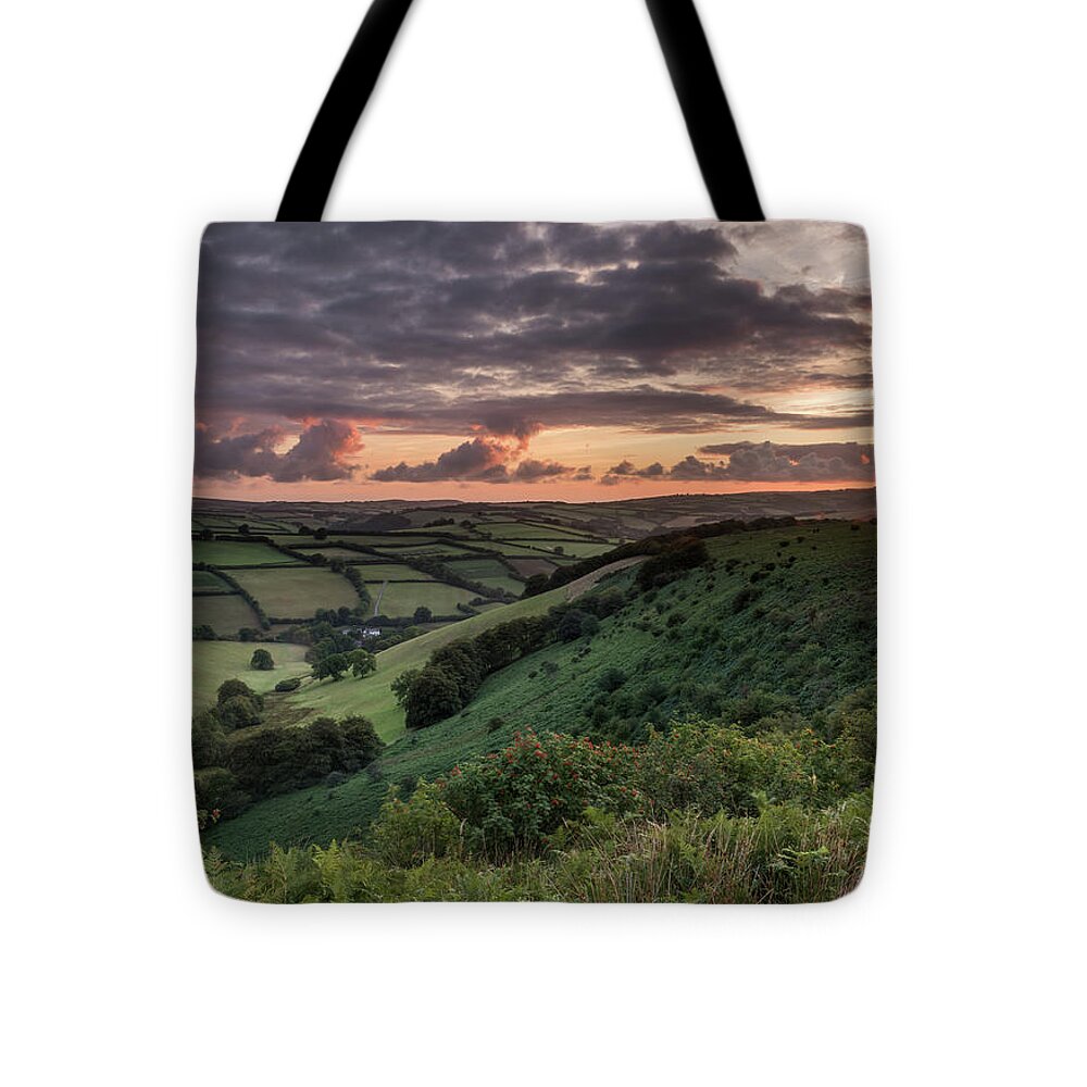 Exmoor National Park Tote Bag featuring the photograph Sunrise Over The Punchbowl, Exmoor, England, UK by Sarah Howard