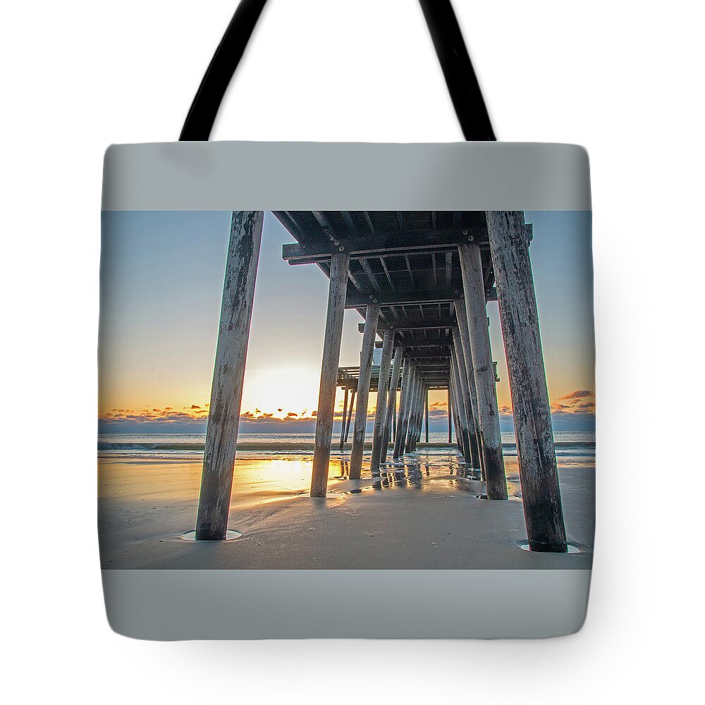 Ocean City Tote Bag featuring the photograph Sunrise Under The Ocean City Fishing Pier by Kristia Adams